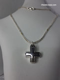 cadena de plata y oro con dije en cruz