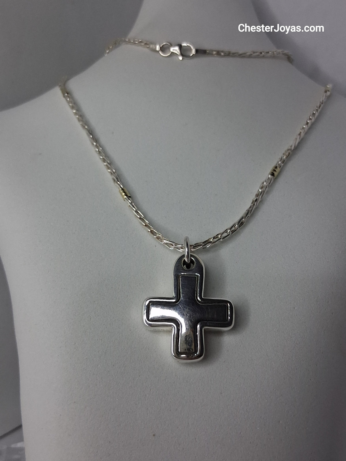 cadena de plata y oro con dije en cruz