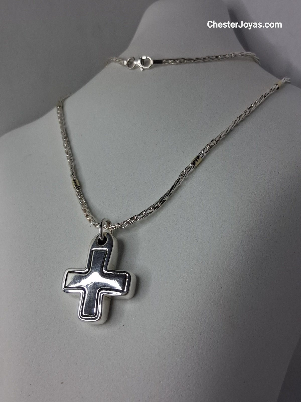 cadena de plata y oro con dije en cruz